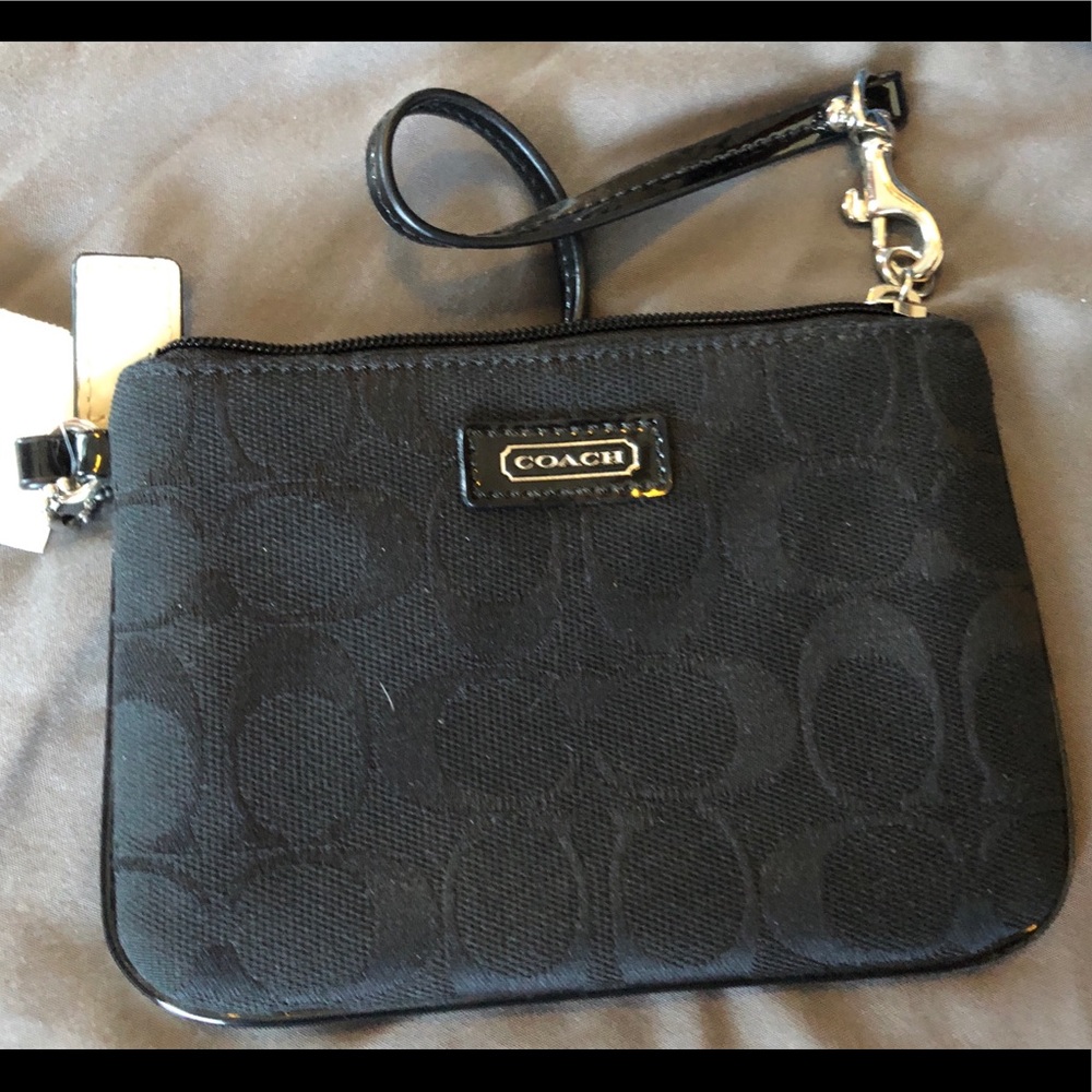Coach wristlet. Brand new, with tags.
